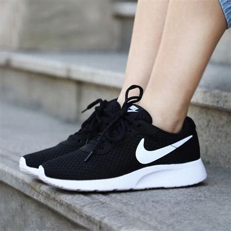 black and white nike shoes women's|nike black with white swoosh.